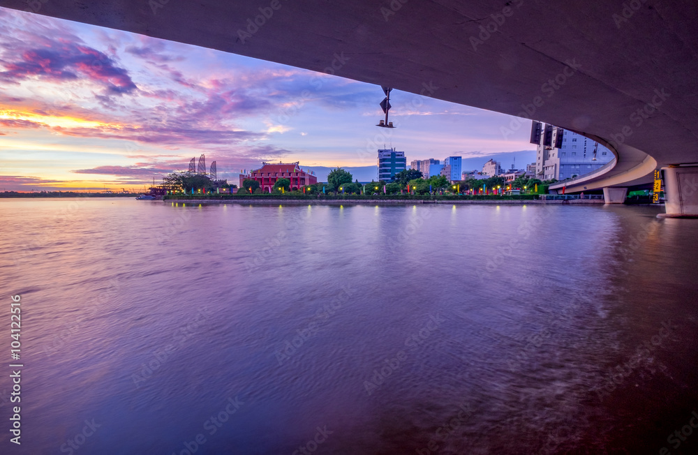 HO CHI MINH, VIETNAM - FEBRUARY 7, 2015 :Enjoy the Nha Rong wharf and Ben Nghe canal sunrise in Ho Chi Minh City.