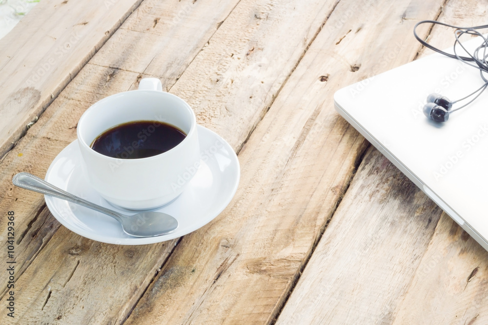 Obraz premium coffee cup on wood table. modern office desktop
