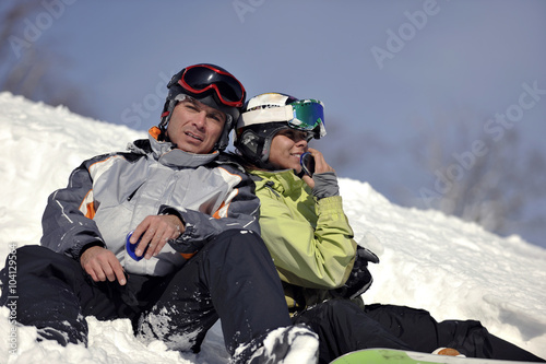 snowboarders couple relaxing