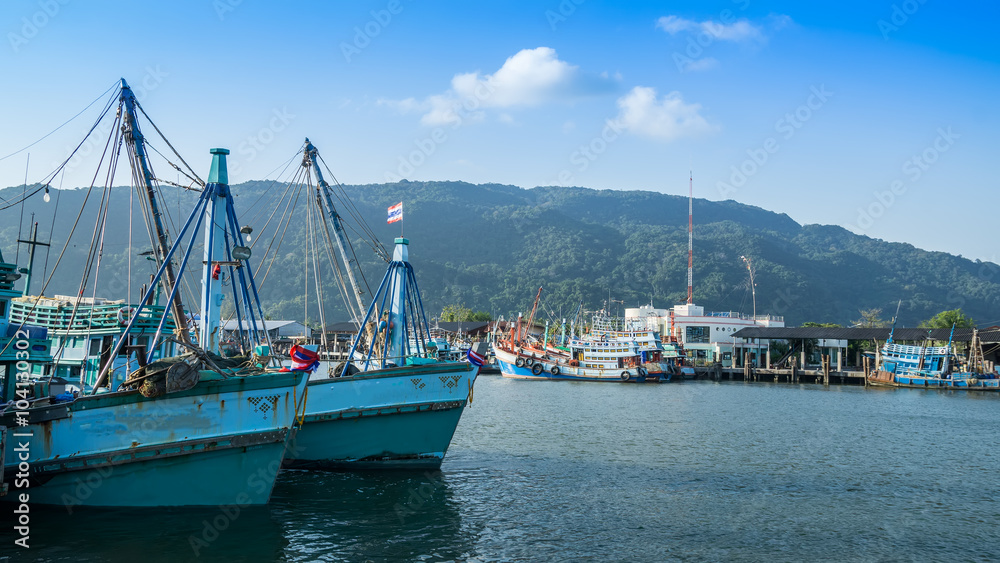 Fishing boats moor at Khanom port , Thailand