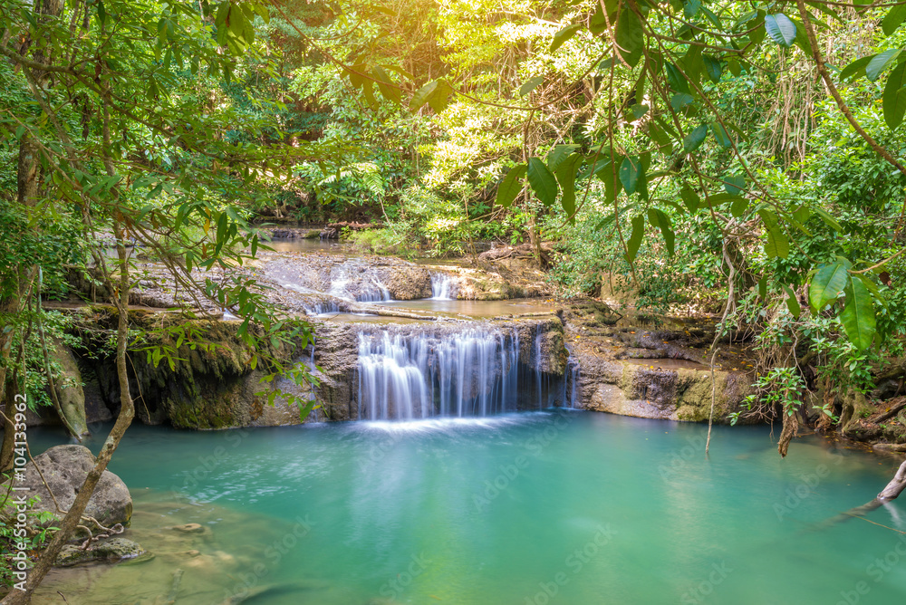Naklejka premium Waterfall in Deep forest at Erawan waterfall National Park
