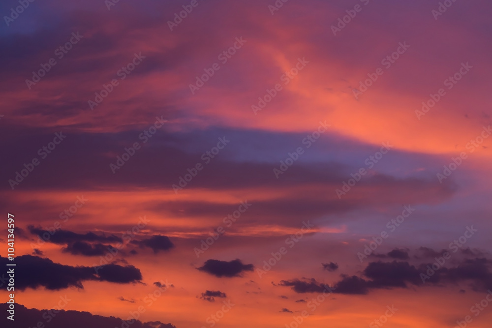Naklejka premium colorful dramatic sunset sky with orange cloud, twilight sky
