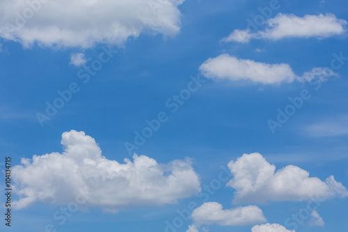 fluffy cloud on clear blue sky background