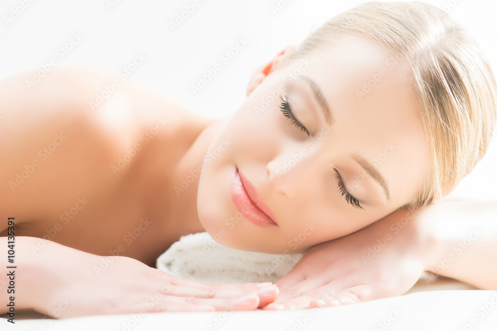 Beautiful girl sleeping and have a spa treatment isolated on white. Beautiful girl sleeping and have a spa treatment isolated on white.