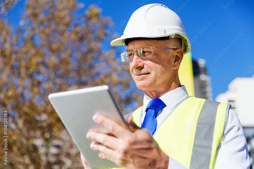 Engineer builder at construction site Engineer builder at construction site