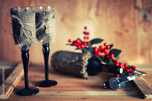 toned wine glass wooden background