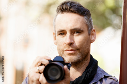 Male photographer taking picture © Sergey Nivens