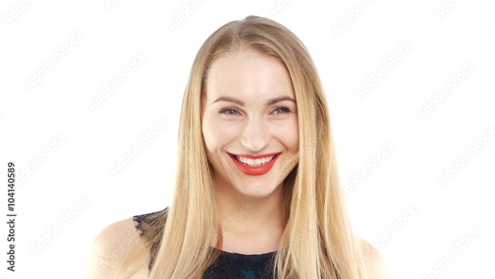 Attractive woman in beautiful dress smiling, dancing, and give air kiss on white, slow motion, close up Attractive woman in beautiful dress smiling, dancing, and give air kiss on white, slow motion, close up