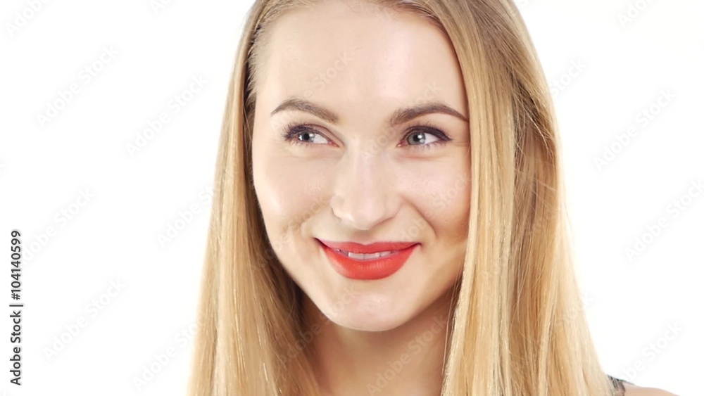 Attractive woman in beautiful dress smiling, and give air kiss on white, slow motion, close up Attractive woman in beautiful dress smiling, and give air kiss on white, slow motion, close up