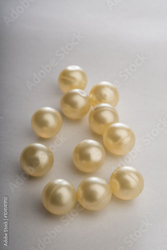Gel capsules on the white background.