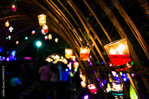 blurry candle backgrounds in the Light © thongsan