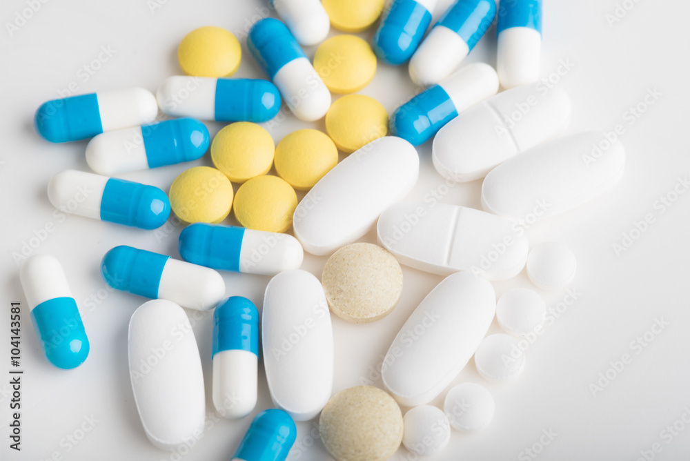 Colorful medicines on a white background.