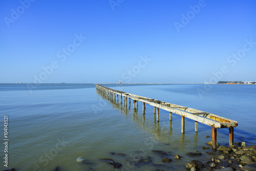 wooden pier in caribbean sea with beautiful blue sky and copy sp © nelzajamal