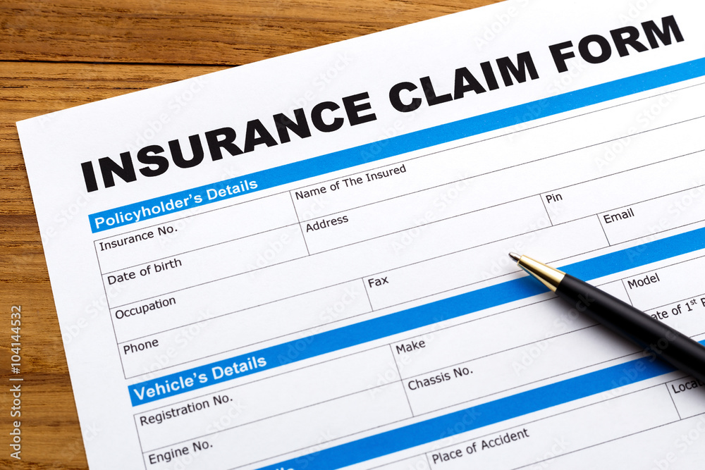 Insurance claim form with pen Insurance claim form with pen