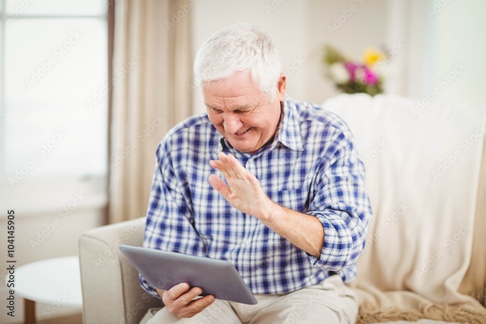 Senior man using digital tablet Senior man using digital tablet