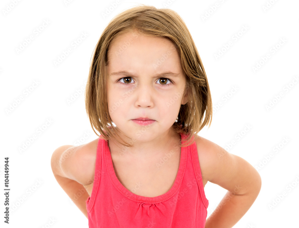 Little girl is angry, mad and looking at the camera Little girl is angry, mad and looking at the camera