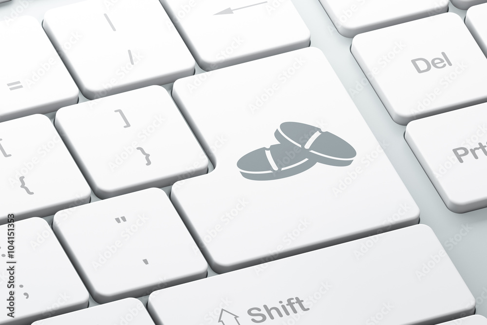 Medicine concept: Pills on computer keyboard background Medicine concept: Pills on computer keyboard background