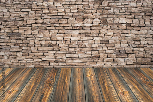 stone wall background with wooden slats floor © Dmytro Holbai