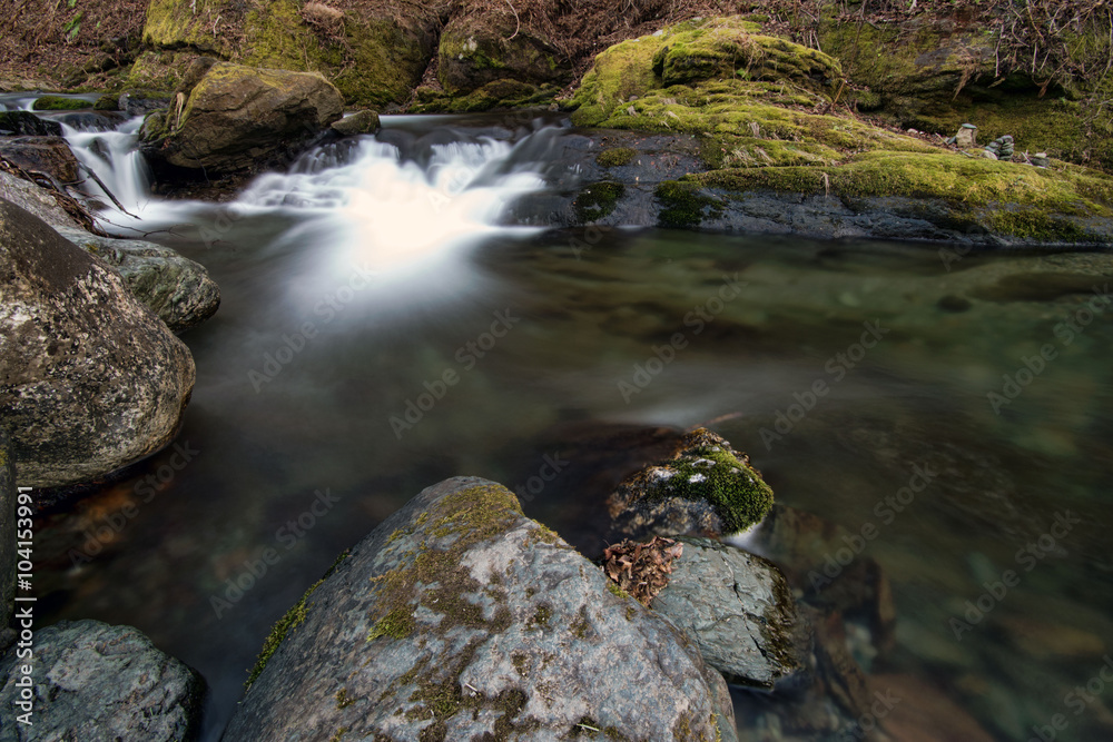 stream of mountain river among stones