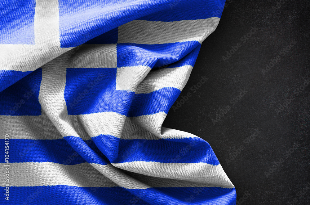 Fototapeta premium Flag of Greece on blackboard background
