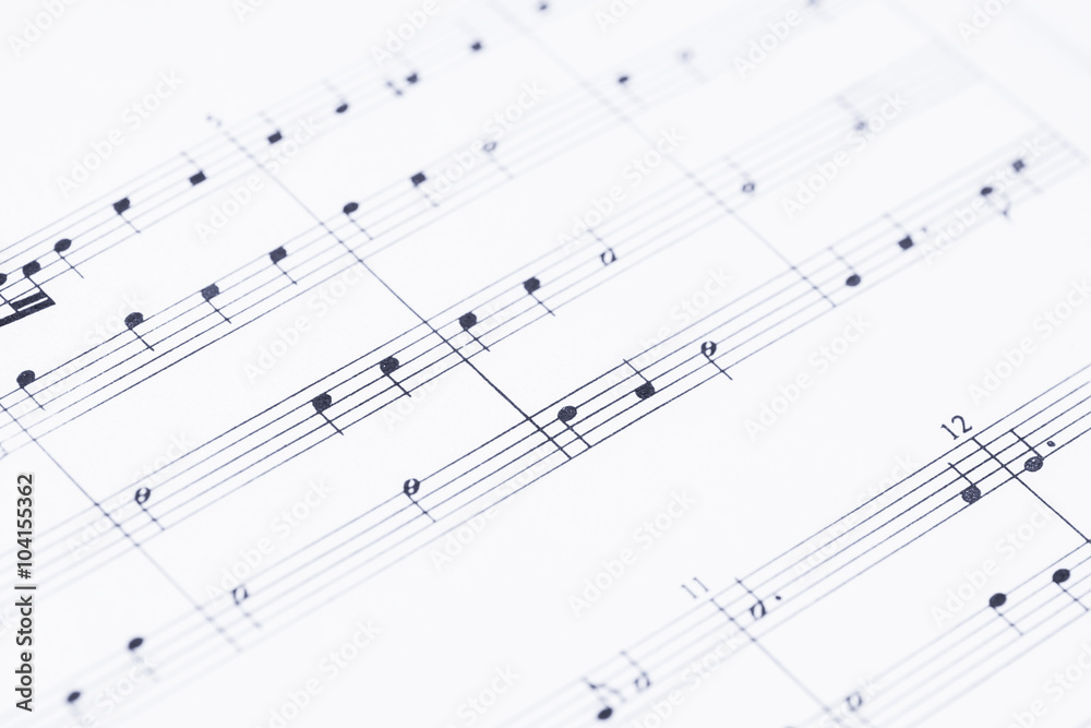 Music notes on paper in close up Music notes on paper in close up