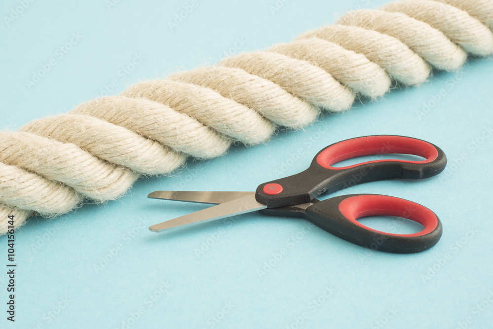 Strong rope and small scissors Stock Photo | Adobe Stock