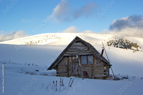 old mountain hut in winter time, Slovakia