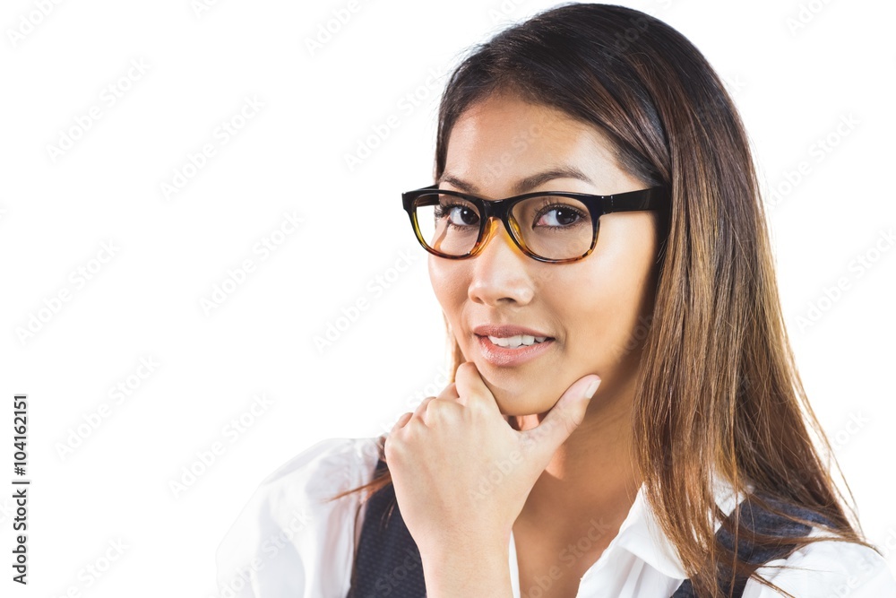 Smiling businesswoman holding her chin