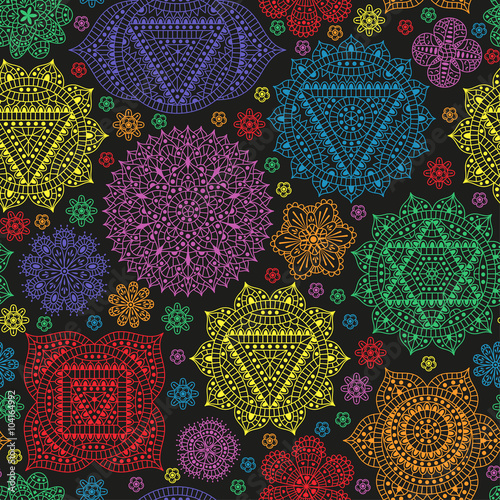 Seamless pattern with seven chakras and flowers. Oriental ornaments for henna tattoo and for your design. Buddhism decorative elements. Vector illustration.