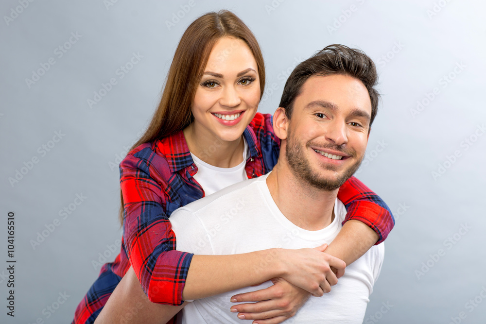 Pleasant young couple embracing 