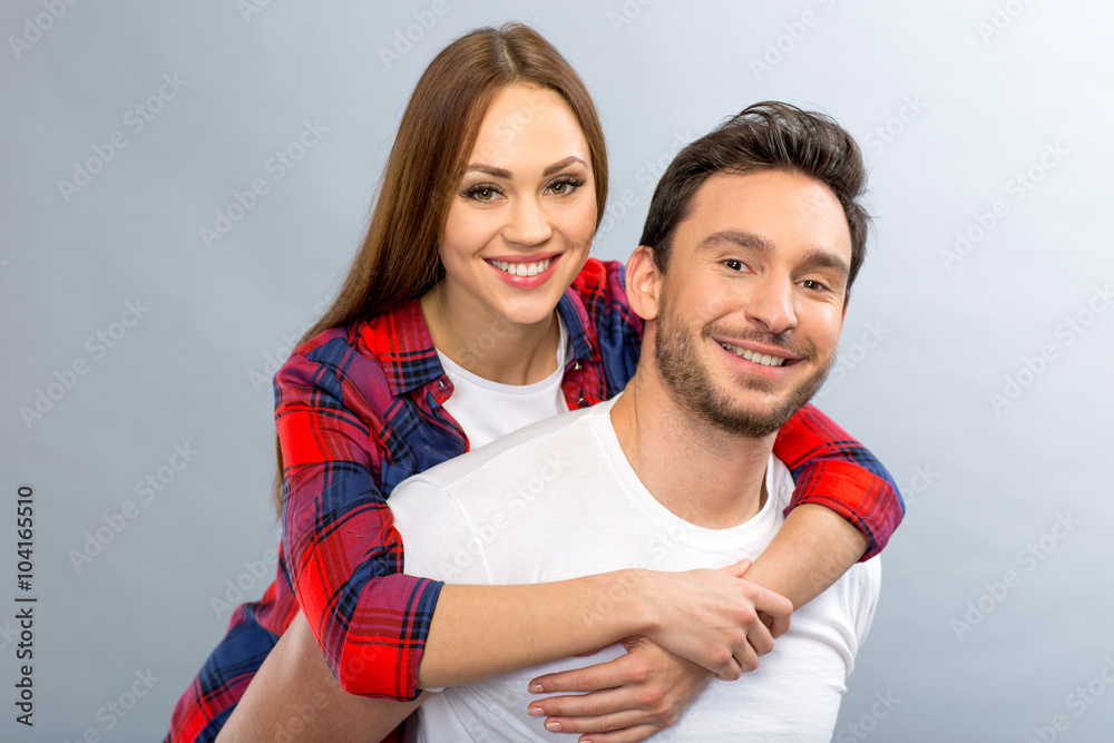 Pleasant young couple embracing Pleasant young couple embracing