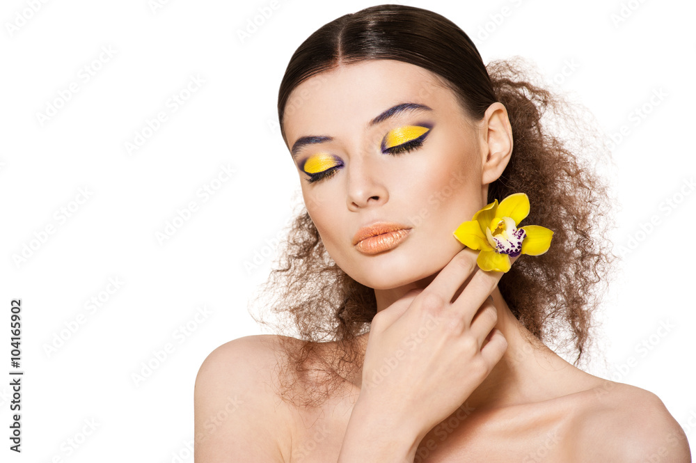 Portrait of a beautiful girl with a flower orchid Portrait of a beautiful girl with a flower orchid