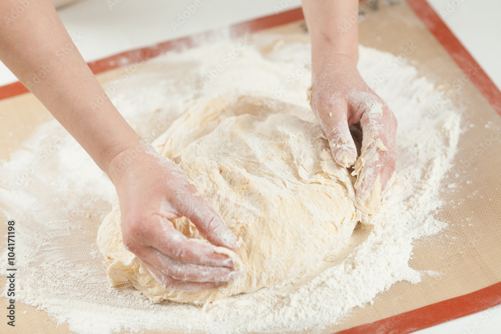 Making dough by hands at bakery