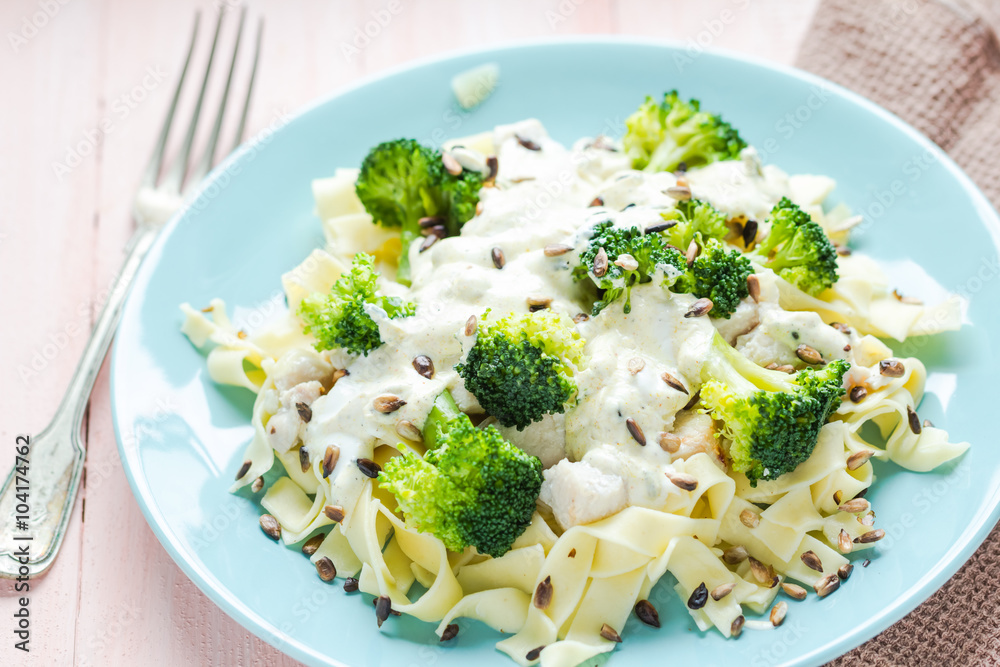Pasta dish broccoli sauce sunflower seeds Pasta dish broccoli sauce sunflower seeds