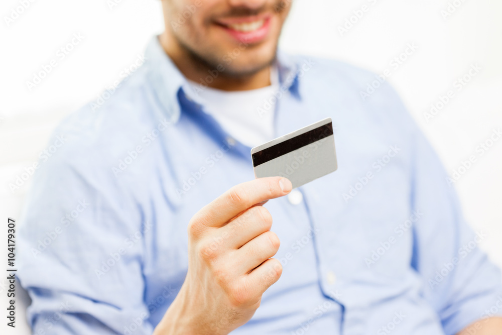 close up of man with credit card close up of man with credit card