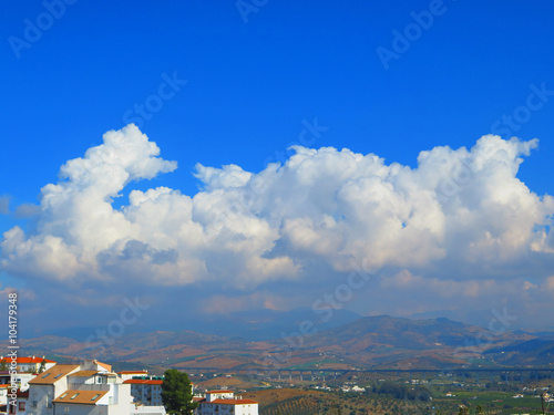 Clouds over valley photo