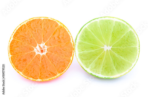 Half of tangerine and lime isolated on the white background with clipping path