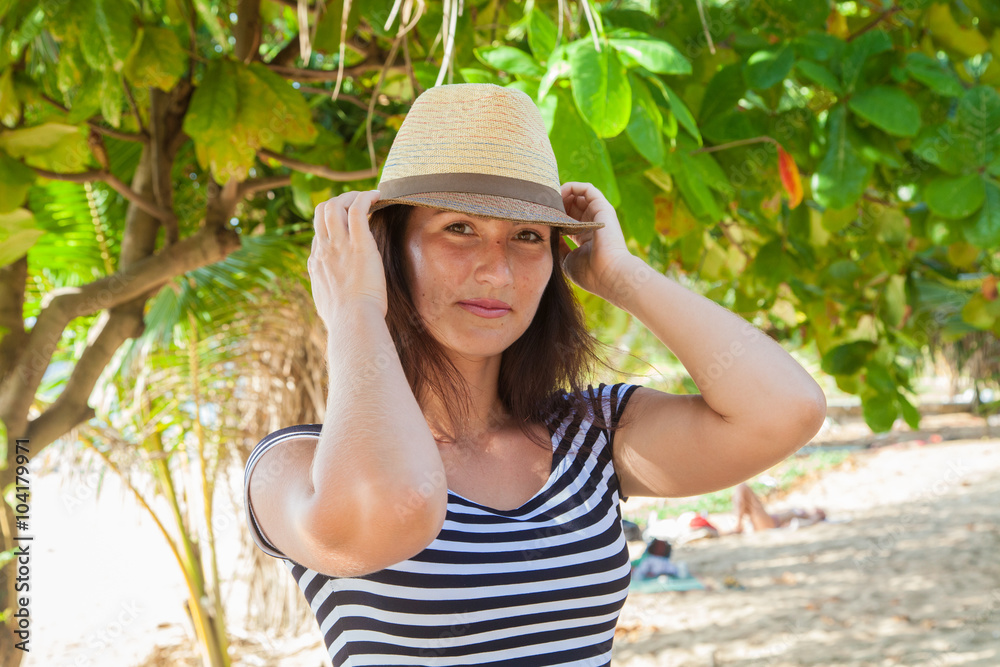 girl in a straw hat on vacation