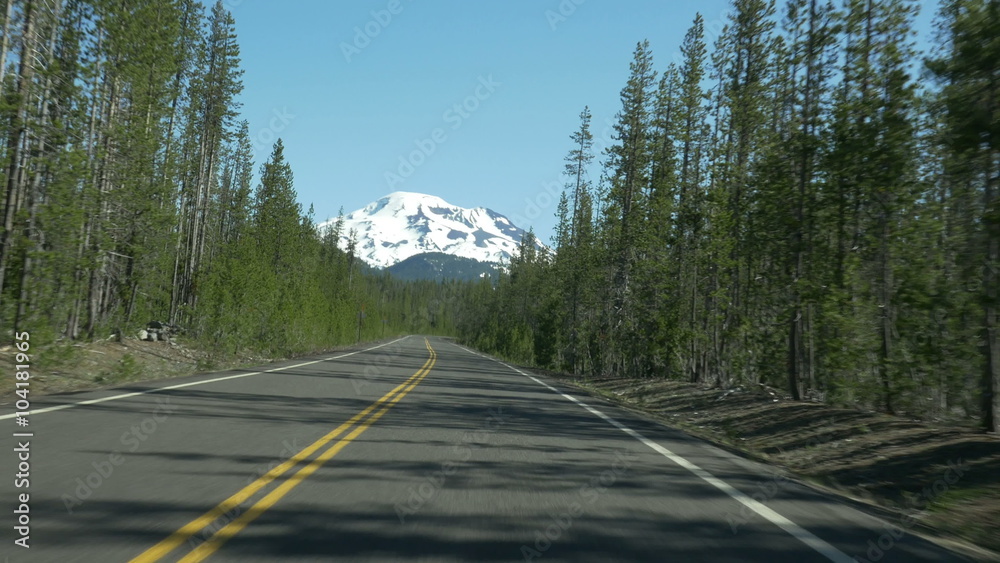 Driving POV on the Cascade Lakes Scenic Byway in Central Oregon, approaching South Sister; Panasonic GH4.