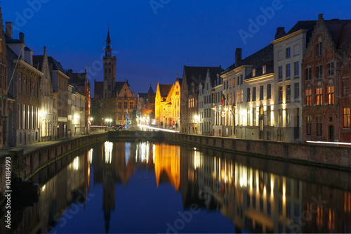 Scenic night cityscape with views of Spiegelrei and Jan van Eyckplein in Bruges, Belgium