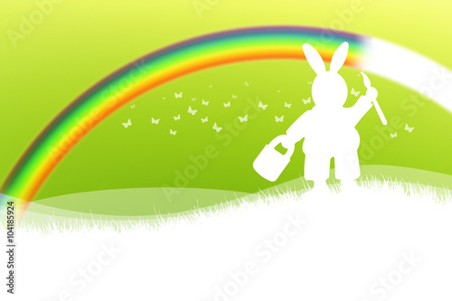 Osterhase malt Regenbogen