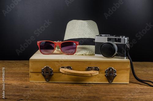 Concept of travelling with vintage camera and accessories 