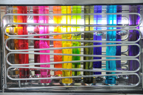 Fototapeta Naklejka Na Ścianę i Meble -  Silk color dyeing machine, Thailand local cottage industries.