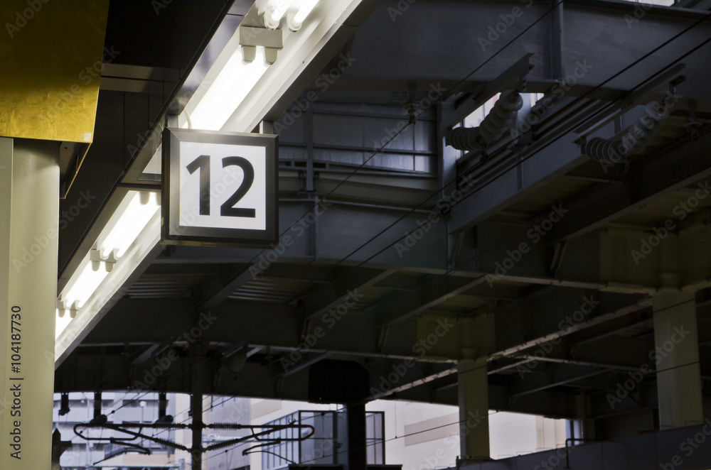 Twelve number label on the train station platform. Twelve number label on the train station platform.