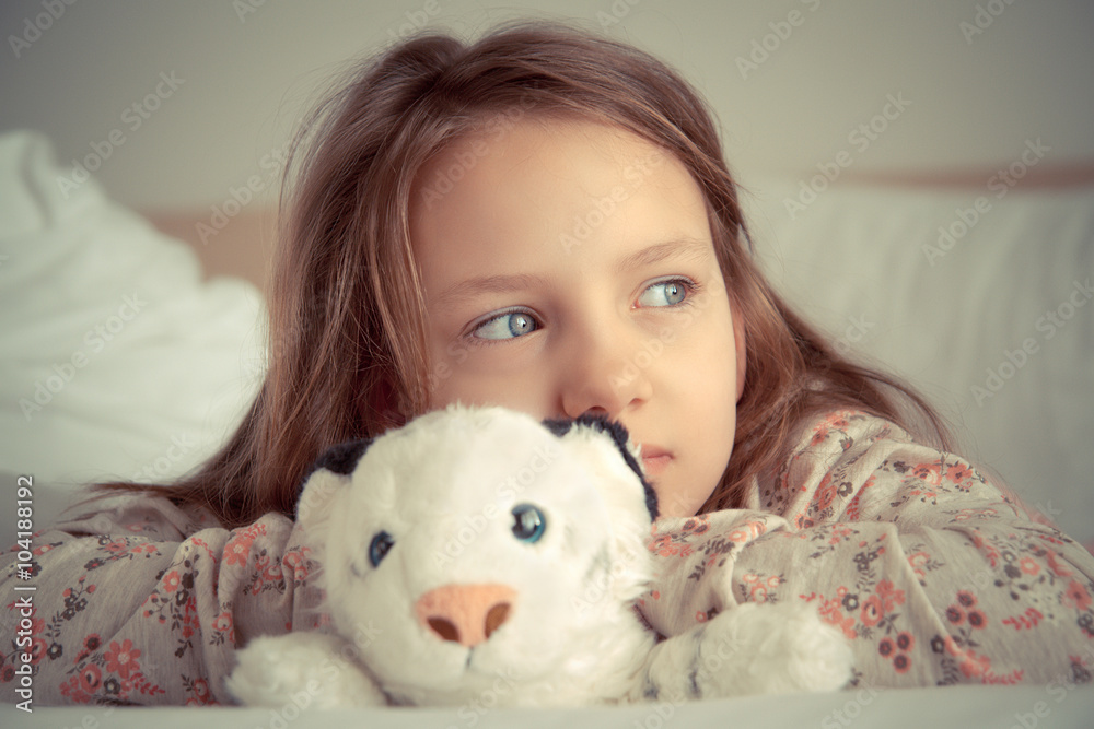 girl with soft toy in bed girl with soft toy in bed