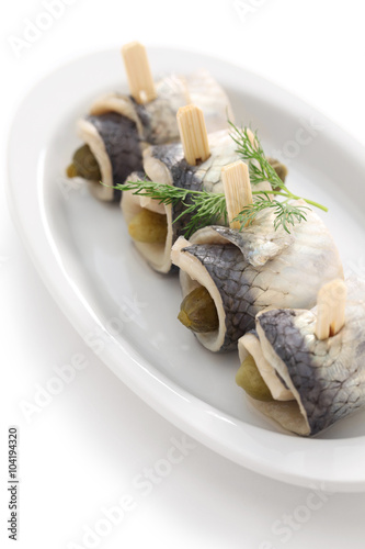 homemade rollmops, rolled pickled herring fillets