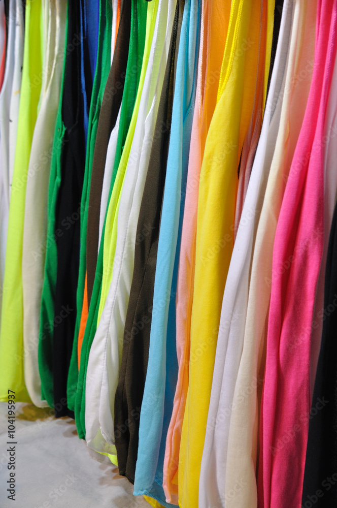 Multicolor cloth arrange in cloth line.