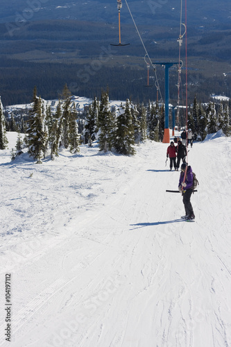 riding a ski resort t-bar lift