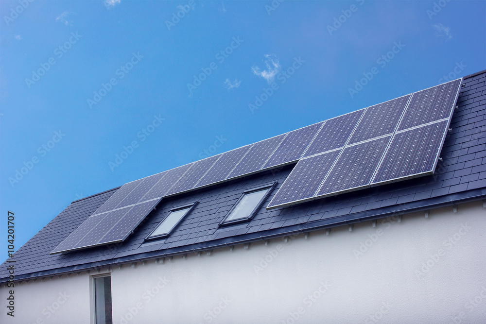 Solar Panels On House Roof. Sustainable Renewable Energy Solar Panels On House Roof. Sustainable Renewable Energy
