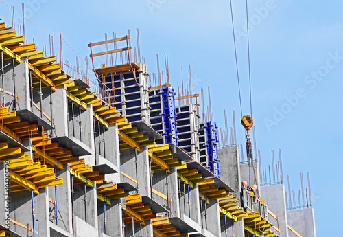 Concrete formwork with a folding mechanism and floor beams on construction site photo